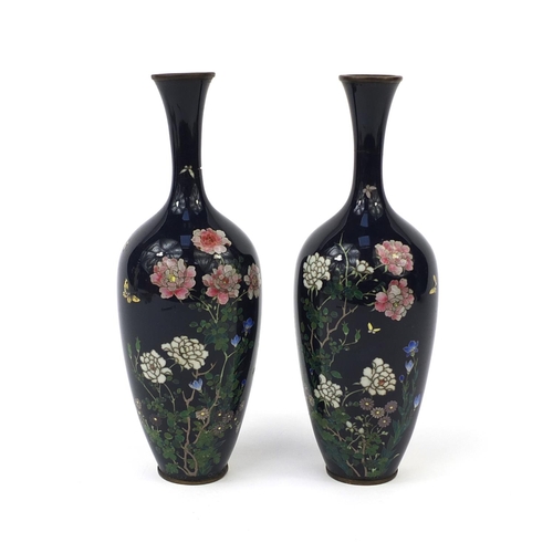 652 - Pair of Japanese cloisonné vases enamelled with butterflies amongst flowers, each 18.5cm high