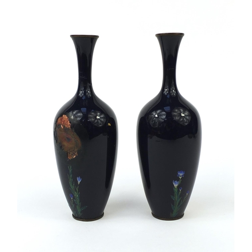 652 - Pair of Japanese cloisonné vases enamelled with butterflies amongst flowers, each 18.5cm high