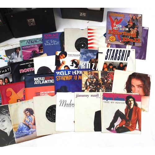 588 - Six cases of 45RPM vinyl records including Lionel Richie, The Beatles and Madonna examples