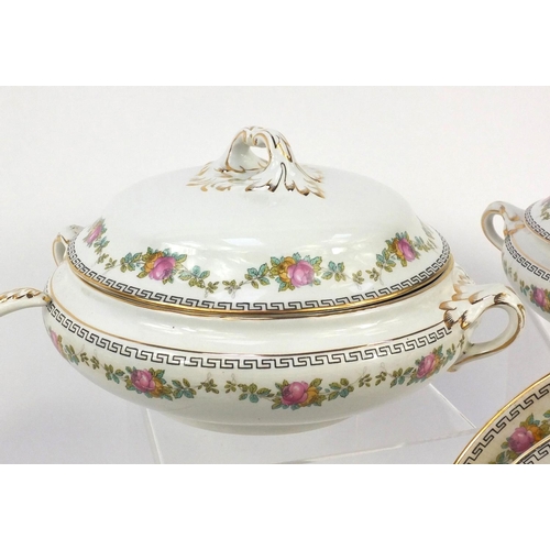 302 - Booths part dinner service decorated with Greek key and pink flowers, including tureens with covers,... 