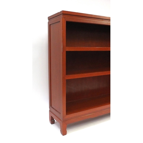 147 - Oriental hardwood open bookcase fitted with three shelves, 118cm high x 127cm wide x 31cm deep