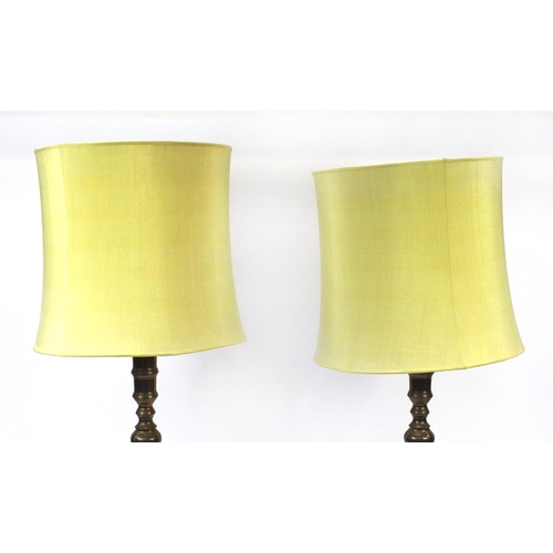 70 - Pair of bronzed metal standard lamps with shades, each 189cm high