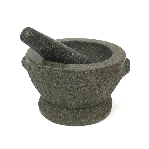 252 - Carved granite pestle and mortar, the mortar 12cm high