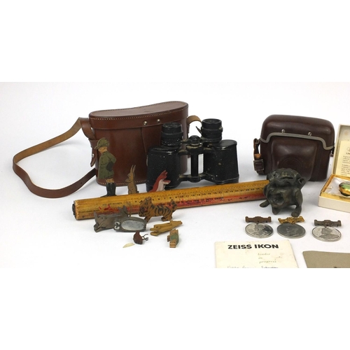 306 - Box of items including binoculars, camera, grotesque inkwell, enamel pill box etc