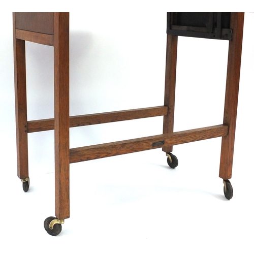 136 - Besway cantilever tea trolley with Bakelite handle and plaque, 74cm high