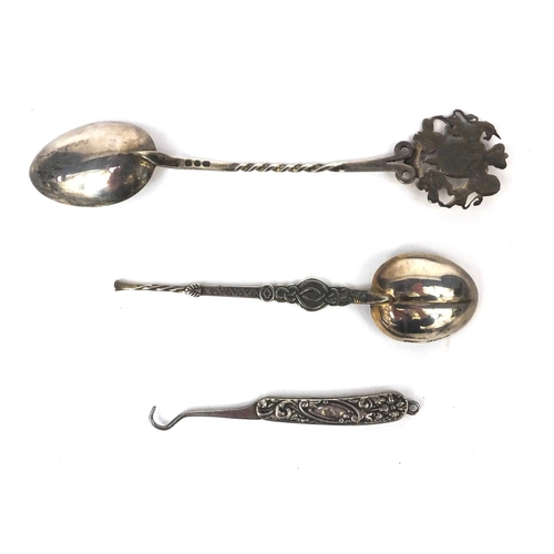 400 - Two silver teaspoon's together with a silver flanked button hook, various hallmarks