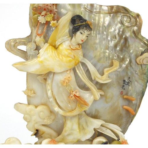 637 - Oriental Mother of Pearl sculpture of a female and shell, together with two others, the largest 25cm... 