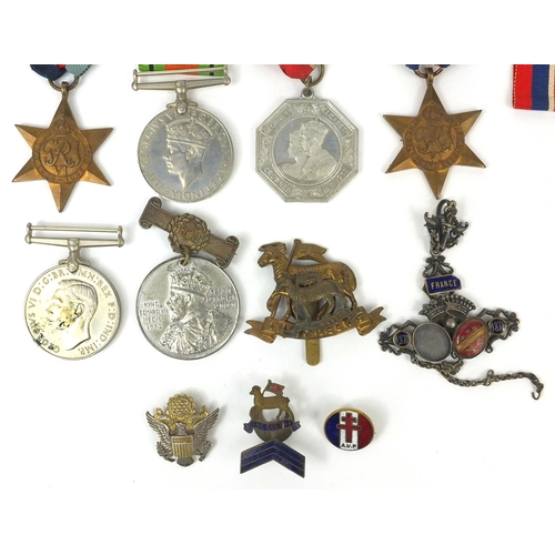 772 - Military items including World War II medals, 19th century French enamelled pendant, World War II Am... 