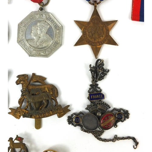 772 - Military items including World War II medals, 19th century French enamelled pendant, World War II Am... 