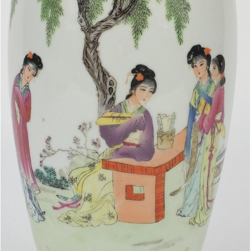 205 - Oriental porcelain baluster shaped vase decorated with females under a tree, 31cm high