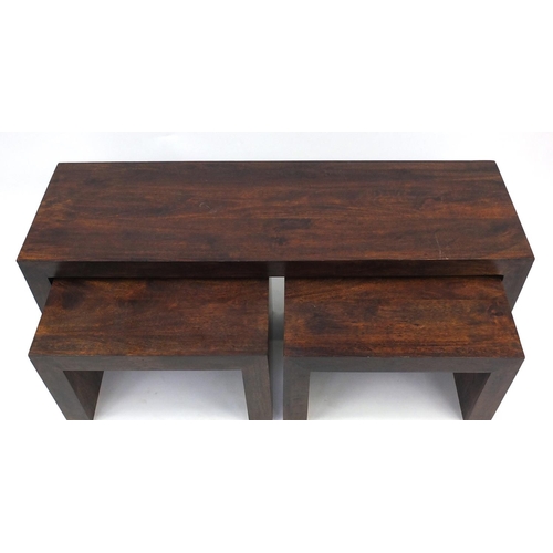 84 - Large rectangular oak coffee table with two smaller tables underneath, the largest 50cm high x 150cm... 