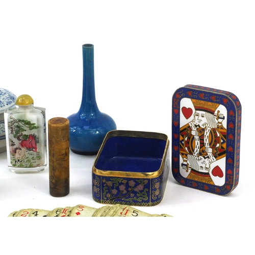 479 - Group of Oriental items including cloisonné boxes and covers, a carved soapstone weight, blue and wh... 