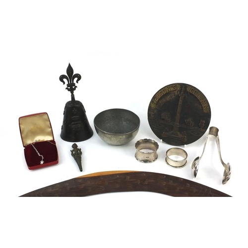 294 - Assorted wooden and metal items including two silver napkin rings, a bronze Nelson's Column plaque, ... 