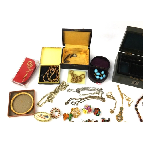 388 - Box of vintage and later costume jewellery including necklaces, brooches, earrings etc and a Victori... 