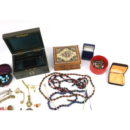 388 - Box of vintage and later costume jewellery including necklaces, brooches, earrings etc and a Victori... 