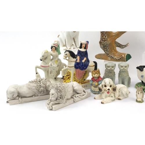 478 - Collection of china and pottery animals including a pair of Sutherland bone china seated dogs, Staff... 