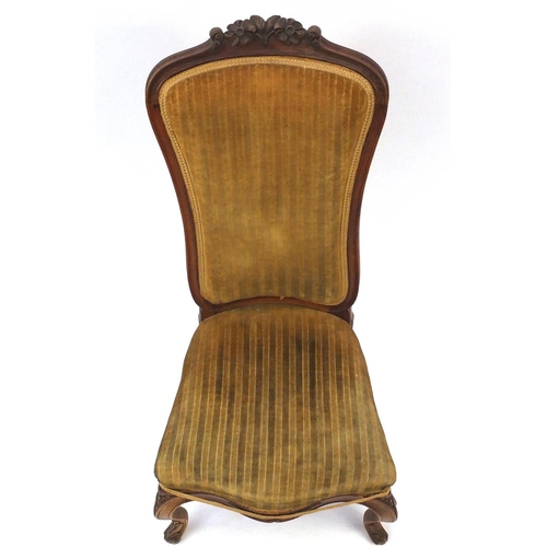 21 - Carved walnut nursing chair with gold striped upholstery, 90cm high
