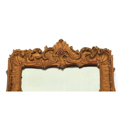 140 - Ornate gilt framed wall hanging mirror with bevelled plate, 58cm x 41cm