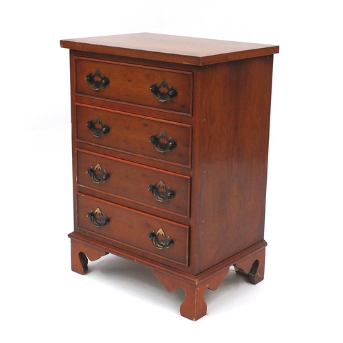 22 - Yew four drawer chest of small proportions, 63cm high x 45cm wide x 32cm deep