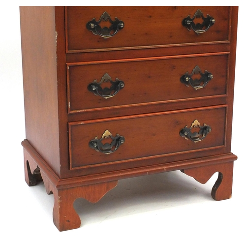 22 - Yew four drawer chest of small proportions, 63cm high x 45cm wide x 32cm deep
