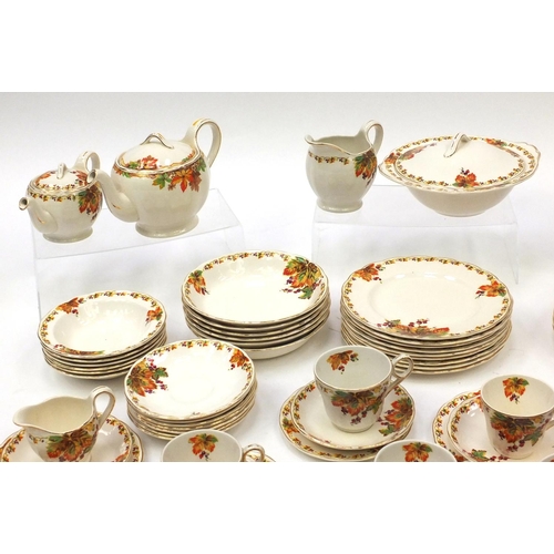 581 - Grindley cream petal patterned dinner/tea service including teapot, dinner plates, cups, saucers etc