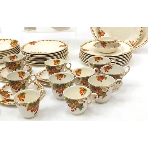 581 - Grindley cream petal patterned dinner/tea service including teapot, dinner plates, cups, saucers etc