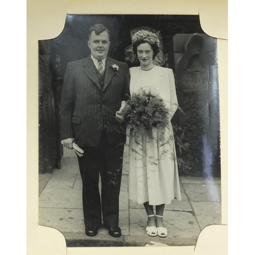 756 - Victorian leather bound photograph album with black and white photographs, a wedding album of black ... 