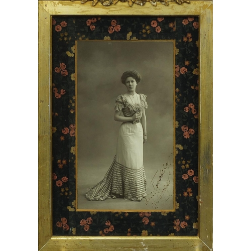 504 - Ink inscribed black and white photograph of a young lady wearing a dress, mounted and gilt framed, 2... 