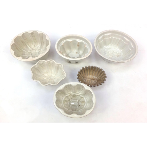 229 - Antique and later ceramic jelly moulds including Copeland and Malkin examples, together with a coppe... 