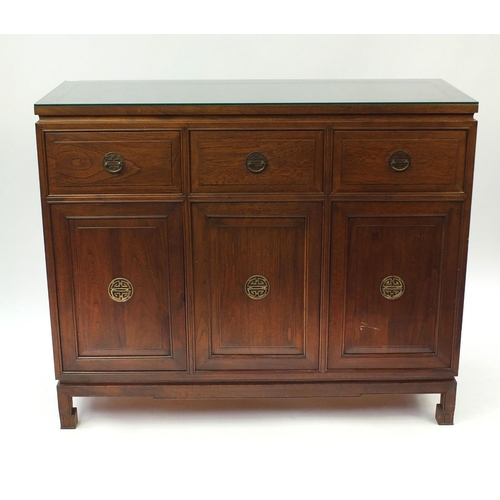 2012 - Chinese rosewood sideboard fitted with three drawers above three cupboard doors, with glass top, 101... 