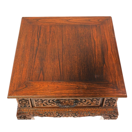 2023 - Pair of Indonesian hardwood side tables, each with a frieze drawer and carved with flowers and folia... 