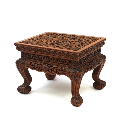 2036 - Indonesian hardwood occasional table carved with flowers and foliage, 38cm high x 50cm wide x 40cm d... 