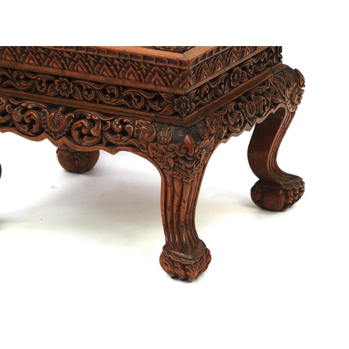 2036 - Indonesian hardwood occasional table carved with flowers and foliage, 38cm high x 50cm wide x 40cm d... 