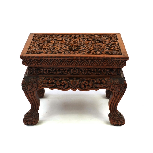 2036 - Indonesian hardwood occasional table carved with flowers and foliage, 38cm high x 50cm wide x 40cm d... 