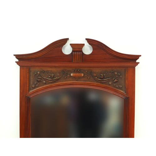 2037 - Edawrdian carved walnut bevelled edged mirror, 109cm x 65cm wide