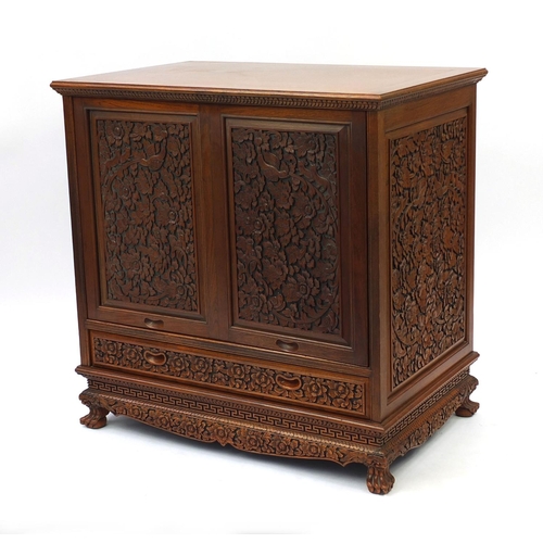 2028 - Thai hardwood cabinet profusely carved with flowers and foliage, 91cm high x 90cm wide x 58cm deep