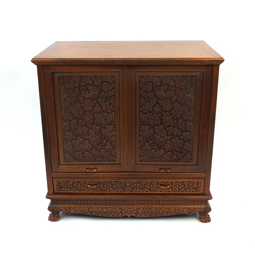 2028 - Thai hardwood cabinet profusely carved with flowers and foliage, 91cm high x 90cm wide x 58cm deep