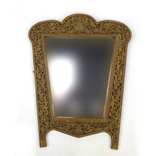 2030 - Ornate gilt wooden mirror carved with foliage, 80cm high x 62cm wide