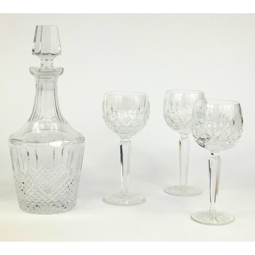 2099 - Set of six Waterford Crystal toasting glasses together with a cut glass decanter, the decanter etche... 