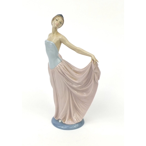 2067 - Lladro figurine of a ballerina with box, factory marks to the base, numbered 5050, 31cm high