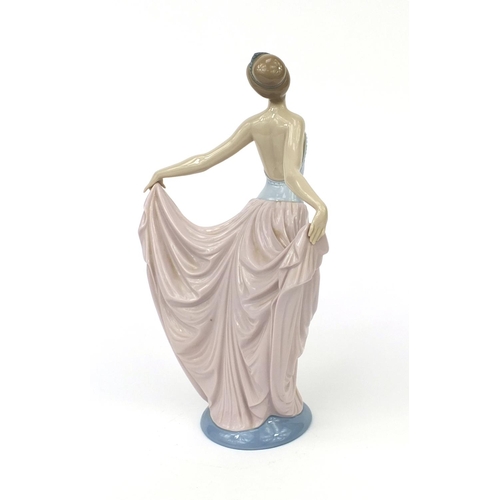 2067 - Lladro figurine of a ballerina with box, factory marks to the base, numbered 5050, 31cm high