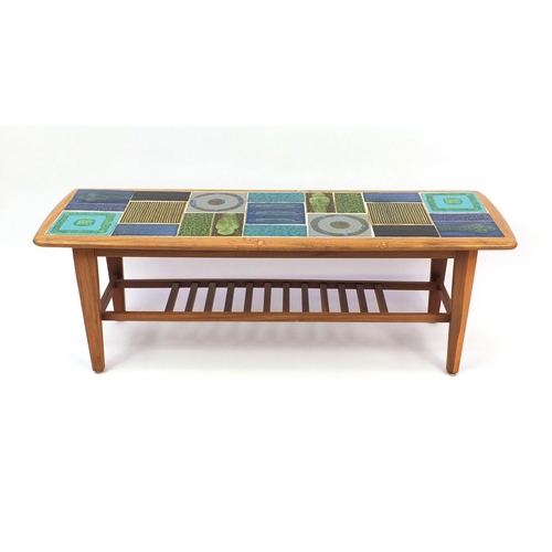 2038 - 1970's tile topped coffee table with laddered under tier, 40cm high x 115cm wide x 39cm deep