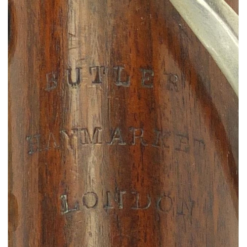 235 - Butler Hey Market of London four piece rosewood clarinet with nickel mounts, impressed marks, 69 cm ... 