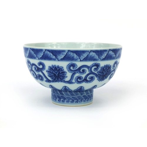 494 - Chinese blue and white porcelain footed bowl, hand painted with flowers and foliate scrolls, six fig... 