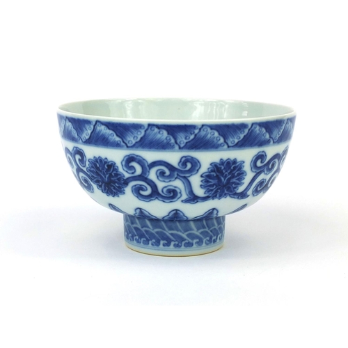 494 - Chinese blue and white porcelain footed bowl, hand painted with flowers and foliate scrolls, six fig... 