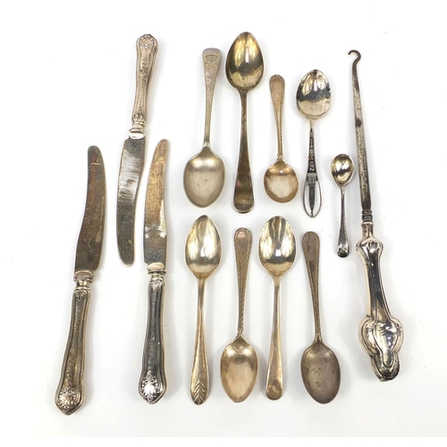 2295 - Predominantly silver items including flatware and a silver handled button hook, various hallmarks, a... 