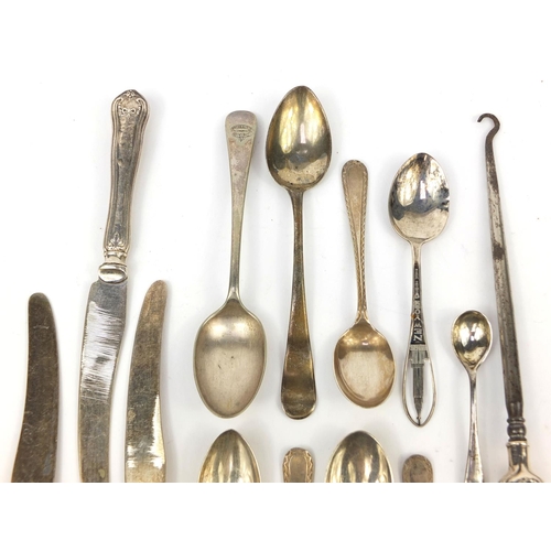 2295 - Predominantly silver items including flatware and a silver handled button hook, various hallmarks, a... 