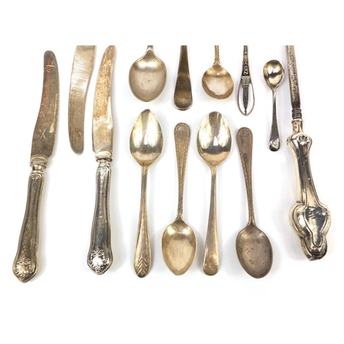 2295 - Predominantly silver items including flatware and a silver handled button hook, various hallmarks, a... 