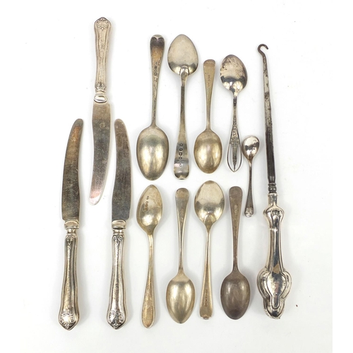 2295 - Predominantly silver items including flatware and a silver handled button hook, various hallmarks, a... 