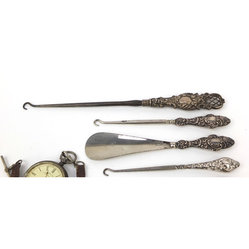 2298 - Silver items including silver handled button hook, bottle opener, silver H E Peck of London pocket w... 